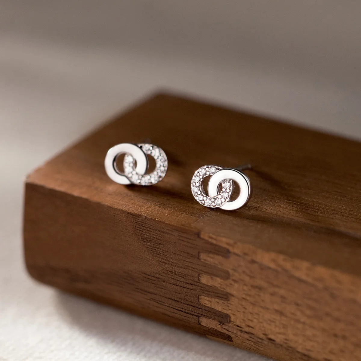 Krenaeminimalist Crystal Interlock Knot Studs – S925 Sterling Silver (Gold / Silver Plating)